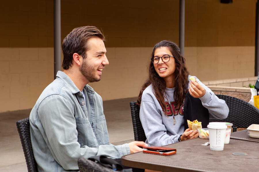 students eating outside